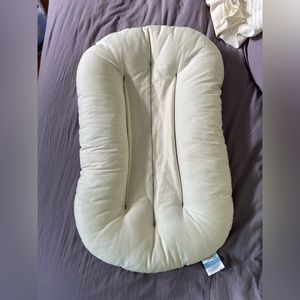 Snuggle me organic infant lounger with 2 covers and a puddle pad